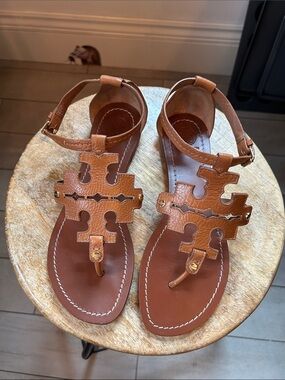 TORY BURCH Tan Brown Leather Logo T-Strap Sandals with Gold Metal Accents